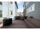Backyard deck space featuring a hot tub between the homes at 3465 Beeler Ct, Denver, CO 80238