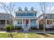 Charming two-story home with a welcoming porch and colorful blue exterior at 3465 Beeler Ct, Denver, CO 80238