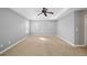Bright main bedroom has neutral colors, carpet floors, and a window view at 3465 Beeler Ct, Denver, CO 80238