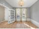 Bright office space featuring hardwood floors, neutral walls, and natural light at 3465 Beeler Ct, Denver, CO 80238