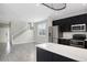 Open concept kitchen featuring stainless steel appliances and hardwood floors at 14441 E 102Nd Ave, Commerce City, CO 80022