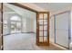 The primary bedroom has an ensuite bathroom and walkout access to the balcony at 7075 Routt St, Arvada, CO 80004