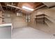 Unfinished basement space with exposed ceiling, offering potential for customization at 6131 Wolff St, Arvada, CO 80003