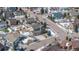 Aerial view of a two-story home in a neighborhood with mountain views and a snowy lawn at 15640 Agate Creek Dr, Monument, CO 80132