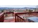 Relaxing back deck with seating area, perfect for enjoying the scenic views of the mountains beyond at 15640 Agate Creek Dr, Monument, CO 80132