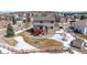 Spacious backyard features a deck, storage shed, and a wooden fence at 15640 Agate Creek Dr, Monument, CO 80132
