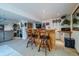 Inviting bar area with comfortable seating, wooden accents, and a view to the adjacent living space at 15640 Agate Creek Dr, Monument, CO 80132