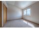 Minimalist bedroom with natural light and ample space for personalization, enhanced by a neutral color palette at 15640 Agate Creek Dr, Monument, CO 80132