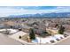 Charming two-story home with a two car garage and mountain views on a sunny day at 15640 Agate Creek Dr, Monument, CO 80132