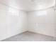 Clean, carpeted bedroom with white walls and two bright windows at 2773 S Franklin St, Denver, CO 80210