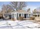 Charming single-story home featuring a well-maintained yard and covered parking at 2773 S Franklin St, Denver, CO 80210