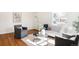 Bright and airy living room showcasing modern decor, hardwood floors, and stylish furnishings at 2773 S Franklin St, Denver, CO 80210