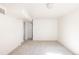 Spacious carpeted living room with bright, white walls at 2773 S Franklin St, Denver, CO 80210