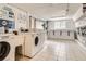 Convenient laundry room with multiple washers and dryers at 1045 N Clarkson St # 105, Denver, CO 80218