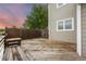 Wooden deck with seating and stairs leading to the backyard, great for outdoor gatherings at 7883 S Espana Way, Centennial, CO 80016