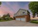 Beautiful exterior elevation of a two-story home with a well maintained lawn and driveway at 7883 S Espana Way, Centennial, CO 80016