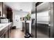 Bright kitchen featuring ample cabinet space, modern appliances, and sleek countertops at 8660 De Soto St, Denver, CO 80229