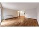 Spacious living room featuring hardwood floors and an open layout, offering versatility in design and functionality at 1350 Josephine St # 208, Denver, CO 80206