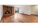 Inviting living room with a brick fireplace and access to a private balcony, perfect for relaxing and entertaining at 1350 Josephine St # 208, Denver, CO 80206