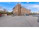 Spacious brick apartment building with an adjacent parking lot at 1350 Josephine St # 208, Denver, CO 80206
