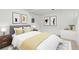 Bright bedroom features modern decor, a comfortable bed, and stylish accents for a relaxing retreat at 381 Mountain Cloud Cir, Highlands Ranch, CO 80126