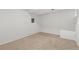 A carpeted bedroom presents a blank canvas ready to be transformed into a cozy and personal space at 381 Mountain Cloud Cir, Highlands Ranch, CO 80126