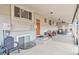 Covered patio with concrete flooring and seating area at 4675 Reed St, Wheat Ridge, CO 80033