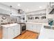 Modern kitchen with stainless steel appliances and a large island at 4675 Reed St, Wheat Ridge, CO 80033