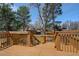 Spacious back deck with wood railings offers a great place for outdoor entertaining and relaxation at 3785 S Benton Way, Denver, CO 80235