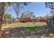 Spacious backyard features a deck, patio, and lush lawn at 3785 S Benton Way, Denver, CO 80235