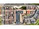 Aerial view featuring rooftop solar panels on modern buildings with well-manicured grounds at 4625 W 50Th Ave # 309, Denver, CO 80212