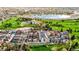 Stunning community and golf course view with a pond, lush trees, and a city skyline at 4625 W 50Th Ave # 309, Denver, CO 80212