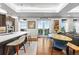 Bright dining area featuring access to an outdoor balcony and views, and seating for four at 4625 W 50Th Ave # 309, Denver, CO 80212