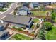 Aerial view of the property featuring a fenced backyard with well-kept landscaping and outdoor entertaining area at 177 Vista Cliff Cir, Castle Rock, CO 80104