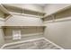 Walk-in closet featuring shelving and storage with wood-style flooring at 177 Vista Cliff Cir, Castle Rock, CO 80104