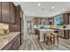 Well-equipped kitchen with stainless steel appliances, granite countertops, and a center island at 177 Vista Cliff Cir, Castle Rock, CO 80104