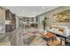 Open-concept living area blending seamlessly with the kitchen, featuring modern decor and ample natural light at 177 Vista Cliff Cir, Castle Rock, CO 80104