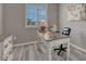 Office featuring gray walls, white trim, and a large window at 177 Vista Cliff Cir, Castle Rock, CO 80104