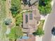 Aerial view showcasing the home's layout, solar panels, well-manicured landscaping, and proximity to the street at 848 Huntington Pl, Highlands Ranch, CO 80126