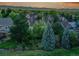 Aerial view of a neighborhood with lush greenery, showcasing the serene and community-oriented setting at 848 Huntington Pl, Highlands Ranch, CO 80126