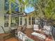 Lovely back deck with multiple seating options and patio table set at 848 Huntington Pl, Highlands Ranch, CO 80126