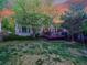 Expansive backyard featuring a wooden deck perfect for outdoor entertaining and relaxation at 848 Huntington Pl, Highlands Ranch, CO 80126