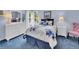 Charming bedroom with blue accents, a plush bed, and ample natural light from the windows at 848 Huntington Pl, Highlands Ranch, CO 80126