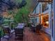 Spacious wooden deck with patio furniture, ideal for outdoor dining and enjoying the beautiful sunset views at 848 Huntington Pl, Highlands Ranch, CO 80126
