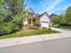 Charming two-story home with well-manicured front yard and mature trees at 848 Huntington Pl, Highlands Ranch, CO 80126
