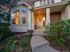 Inviting front porch featuring decorative accents, a welcoming entrance, and charming architectural details at 848 Huntington Pl, Highlands Ranch, CO 80126