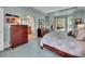 Comfortable main bedroom features a bed and multiple windows providing plenty of natural light at 848 Huntington Pl, Highlands Ranch, CO 80126