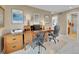 Spacious home office with built-in desk and cabinets, perfect for remote work at 848 Huntington Pl, Highlands Ranch, CO 80126