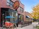 Swing Thai exterior view with traditional rickshaw parked outside at 4917 Lowell Blvd # 105, Denver, CO 80221
