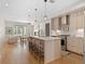 Modern kitchen featuring stainless steel appliances and a large island with barstool seating at 4917 Lowell Blvd # 105, Denver, CO 80221